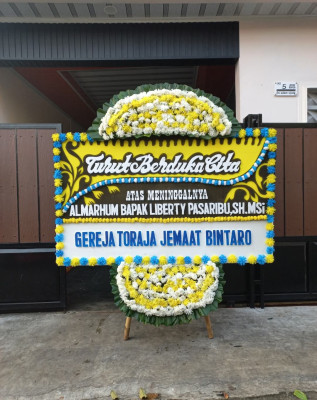 Papan Bunga Duka di Loto