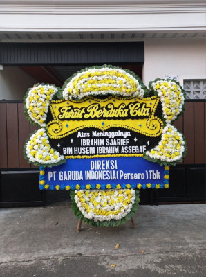 Papan Bunga Duka di Loto